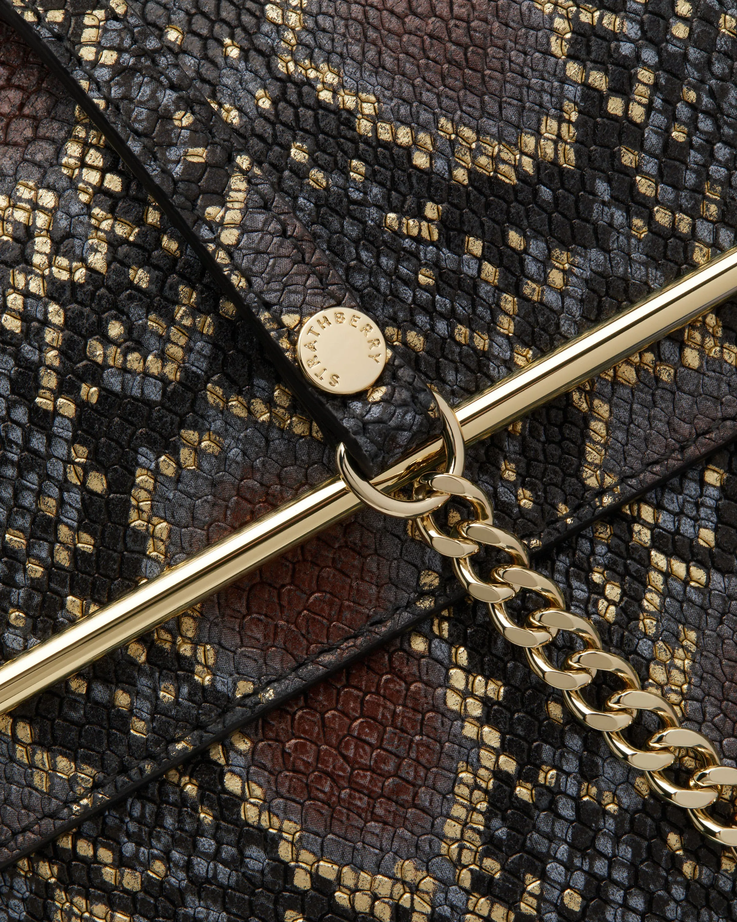 Stylist - Black/Gold Snake-Embossed Leather